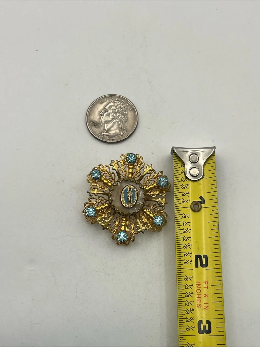 Miraculous medal Catholic Virgin Mary blue rhinestone gold tone starburst brooch